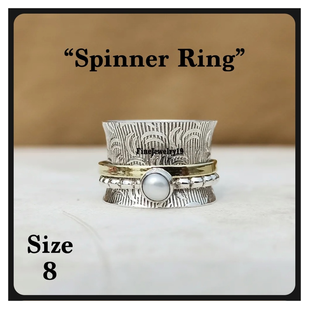 BNWT- Sterling Silver Spinner Ring” With Pearl